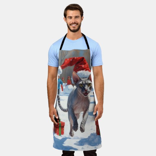 Sphynx Cat läuft im Schnee mit Weihnachtsmütze Schürze (Getragen)