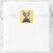 Sphynx-Katze hält Spielcontroller Quadratischer Aufkleber (Tasche)