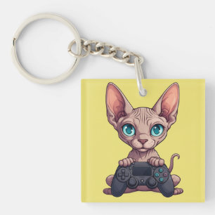 Sphynx-Katze hält Spielcontroller Schlüsselanhänger