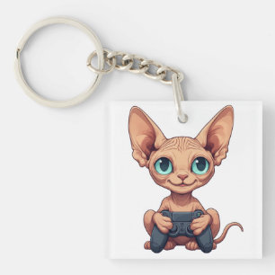 Sphynx-Katze hält Spielecontroller Schlüsselanhänger