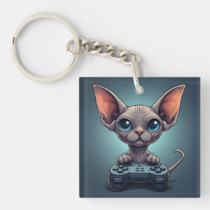 Sphynx-Katze hält Spielecontroller Schlüsselanhänger