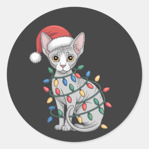 Sphynx-Katze mit Weihnachtsmannmütze und in Weihna Runder Aufkleber