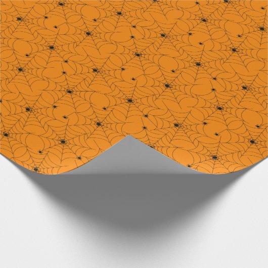 Spiegelung des Webmusters auf dem Orangenpflaster Geschenkpapier (Ecke)