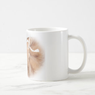 Spielen der Katze Kaffeetasse
