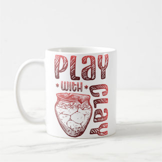 Spielen mit Tonkeramik Kaffeetasse
