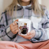 Spielendes böses Katzenmonster in Tränenflasche ge Kaffeetasse