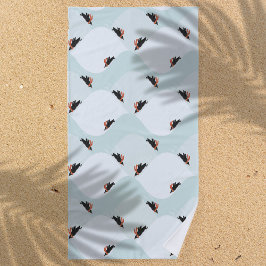 Spielerische Pinguine, die auf dem Schneepattern g Strandtuch