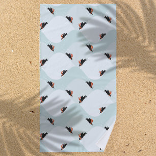 Spielerische Pinguine, die auf dem Schneepattern g Strandtuch