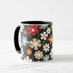 Spielerisches Multicolor-Blumengesteck mit schwarz Tasse