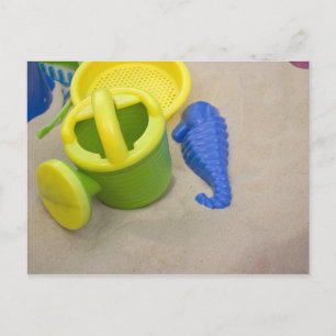Spielzeug am Strand Postkarte
