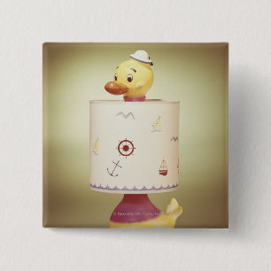 Spielzeugentenlampe Button