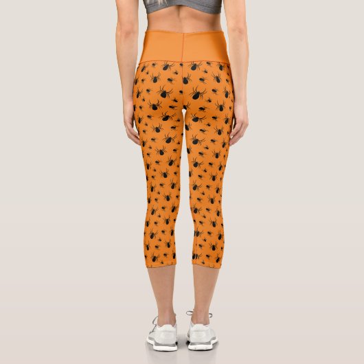 Spinnen Halloween Muster Schwarz und Orange Capri Leggings (Rückseite)
