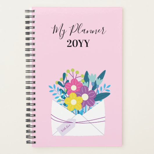 Spiralplaner mit Blume auf rosa Hintergrund Planer (Vorderseite)