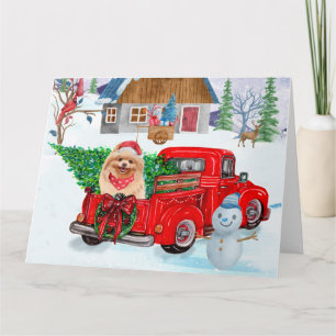 Spitz Hund in der Weihnachtslieferung LKW Schnee Karte