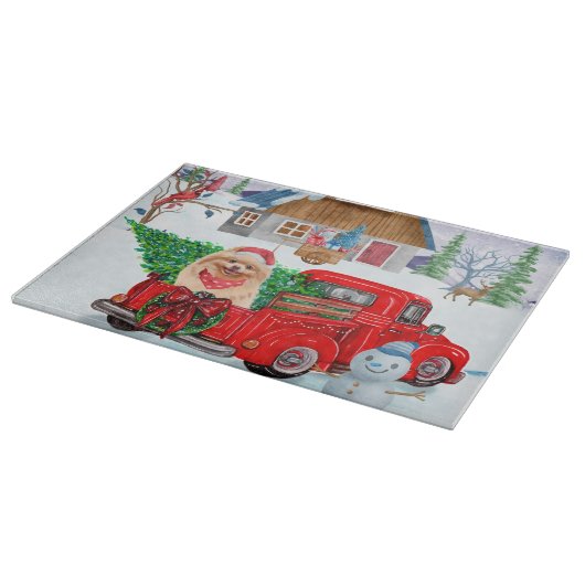 Spitz Hund in der Weihnachtslieferung LKW Schnee Schneidebrett (Ecke)