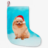 Spitz Hund sitzend am Weihnachtshut am Strand Kleiner Weihnachtsstrumpf (Vorderseite)