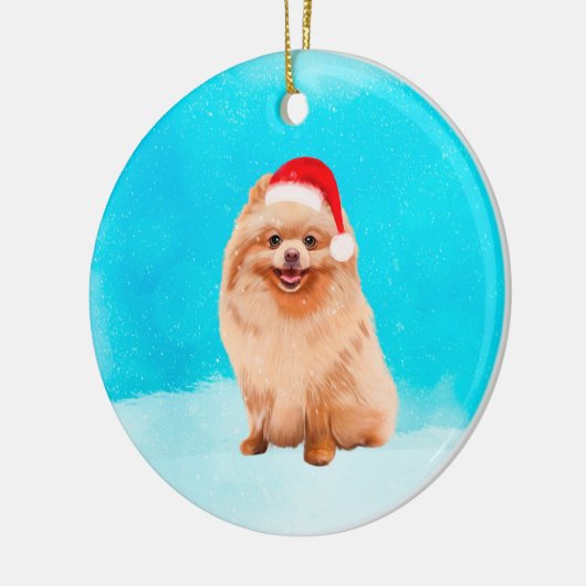 Spitz Hund sitzend im Schnee Weihnachtshut Keramik Ornament (Links)