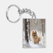 Spitz lässt es Weihnachten schneien Schlüsselanhänger (Vorderseite links)