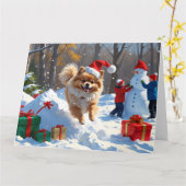 Spitz läuft im Schnee mit Weihnachtshut Karte (Gelbe Blume)