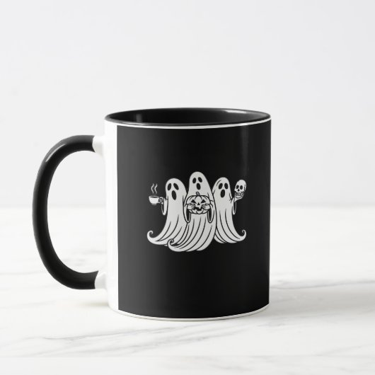 Spooky Coffee Sipping Pumpkin Holding Tasse (Links)