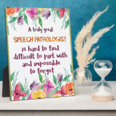 Sprachpathologe gibt Sprachtherapeutin Fotoplatte (Seite)