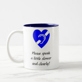 Sprechen Sie bitte langsameres wenig und offenbar! Zweifarbige Tasse