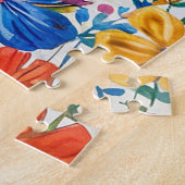 Springer Spanier mit farbenprächtigem Blumenhinter Puzzle (Seite)
