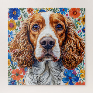 Springer Spanier mit farbenprächtigem Blumenhinter Puzzle