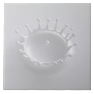 Spritzen von Milch Fliese