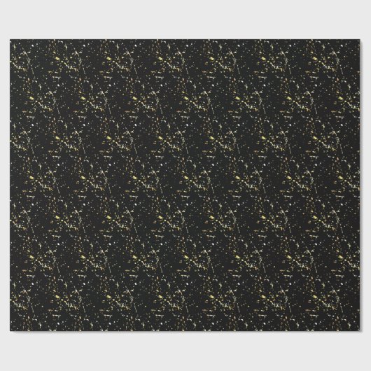 Spritzer mit Goldfarbe auf schwarz Geschenkpapier (Flach)
