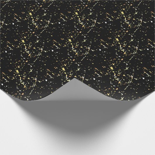 Spritzer mit Goldfarbe auf schwarz Geschenkpapier (Ecke)