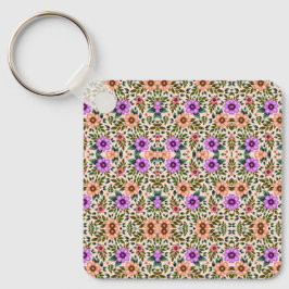Square keychain showcasing a vibrant floral  schlüsselanhänger