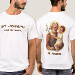 St. Joseph hat meinen Rücken T-Shirt<br><div class="desc">Ein wunderschönes traditionelles Bild des heiligen Josef,  der den Jesus-Säugling mit den Lilien auf der Rückseite hält. Humorer Text auf der Vorderseite. Der unten stehende Text und Schriftart können geändert werden.</div>