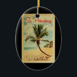 St. Petersburg Palm Tree Vintage Travel Keramik Ornament<br><div class="desc">Ein einzigartig Retro Mitte des Jahrhunderts moderne St. Petersburg Florida Kunstdruck im Vintage Reiseplakatstil. Es verfügt über eine geschwungene Palme am Sandstrand mit Ozean unter einem blauen bewölkten Himmel.</div>