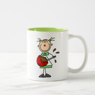 Stäbchenfigur-Bäcker mischt Teig Zweifarbige Tasse