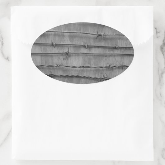 Stacheldraht Ovaler Aufkleber (Tasche)