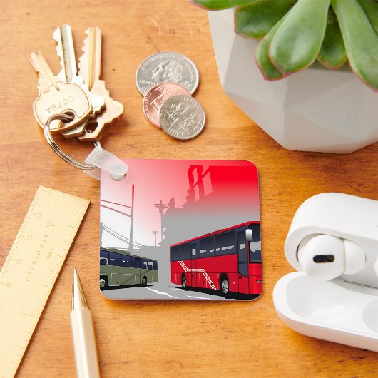 Stadtbusse Rote grüne Busse in der Stadtstraße Schlüsselanhänger