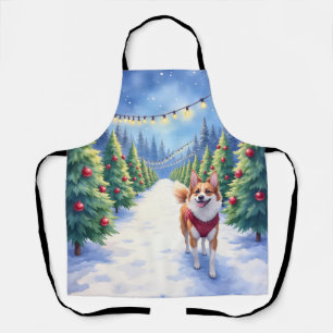 Staffordshire Bull Terrier auf einer Weihnachtsbau Schürze