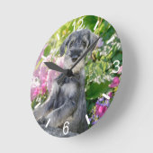 Standard Schnauzer Puppy in a Flowering Garden - Runde Wanduhr (Winkel)