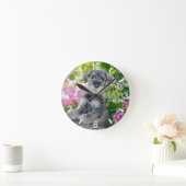 Standard Schnauzer Puppy in a Flowering Garden - Runde Wanduhr (Zuhause)