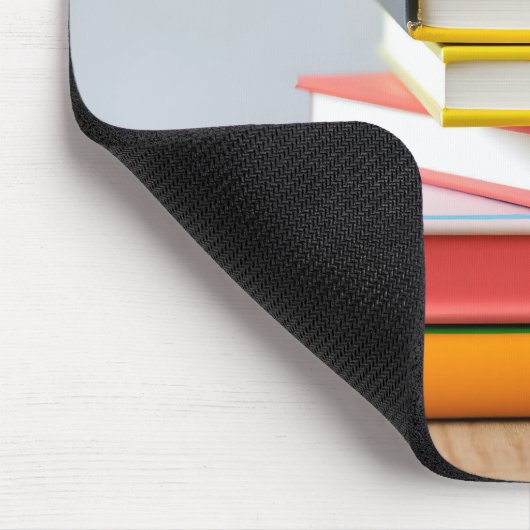 Stapel farbiger Lehrbücher Mousepad (Ecke)