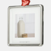 Stapel Schokoladensplitterplätzchen melken in Silbernes Ornament (Links)