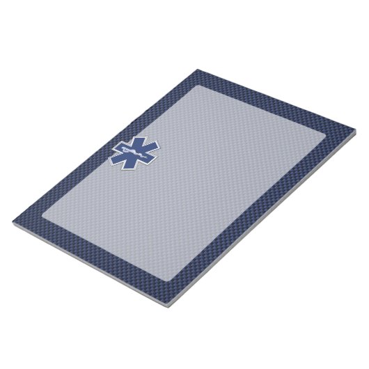Star of Life Paramedic EMS auf blauem Kohlenstofff Notizblock (angewinkelt)