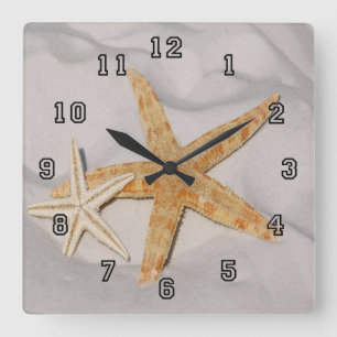 Starfischparade Quadratische Wanduhr