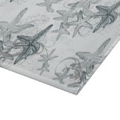 Starfish auf dem Seemuster Schneidebrett (Ecke)