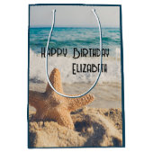 Starfish auf einem Sandy Beach Foto Mittlere Geschenktüte (Vorderseite)