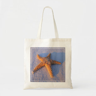 Starfish auf weißem Sand Tragetasche