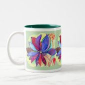 Starflower Tasse auf grünem Hintergrund (Links)
