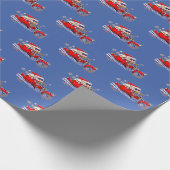 Starker schauender Weihnachtsmann, der sein Geschenkpapier (Ecke)