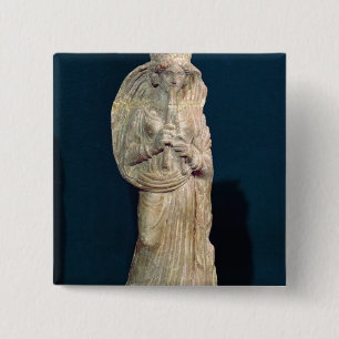 Statuette einer Frau, die eine doppelte Flöte Button
